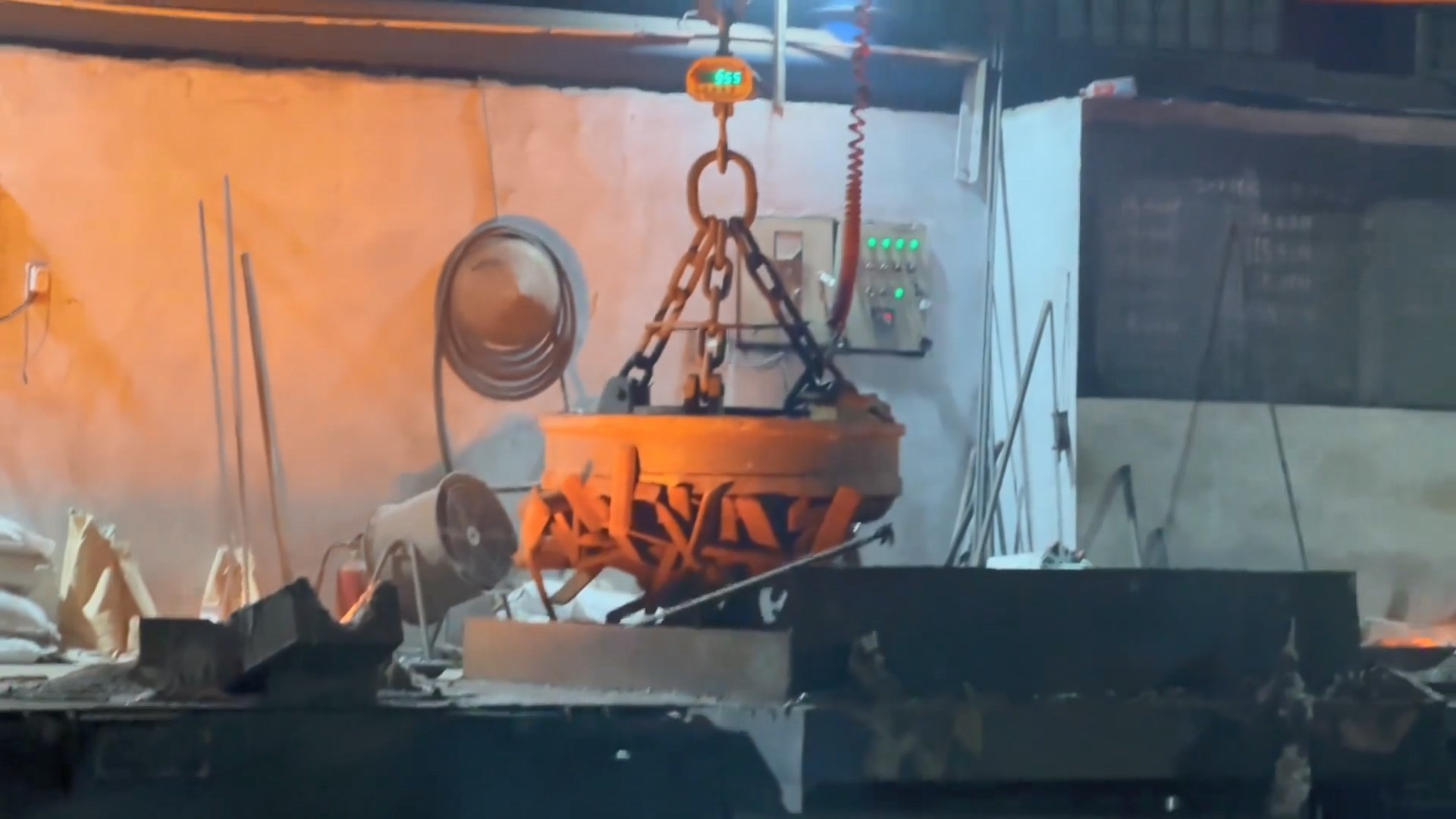 charged into furnace via electromagnetic crane