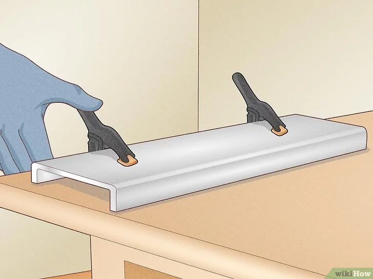 clamp the metal to your workstation