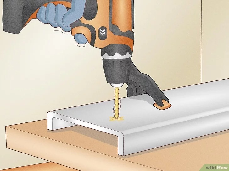 drill through the metal at a slow steady speed