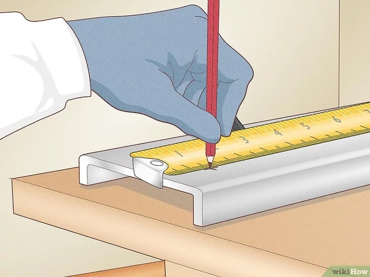 mark the position of the hole with a pencil