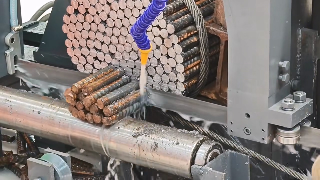 metal band saw cutting steel bars water cooled 1