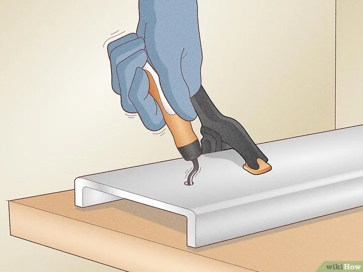 remove sharp edges with a deburring tool