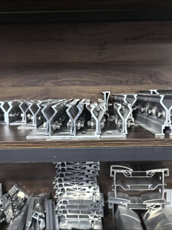 cnc cutter processing rectangular aluminum extrusion for machinery assembly