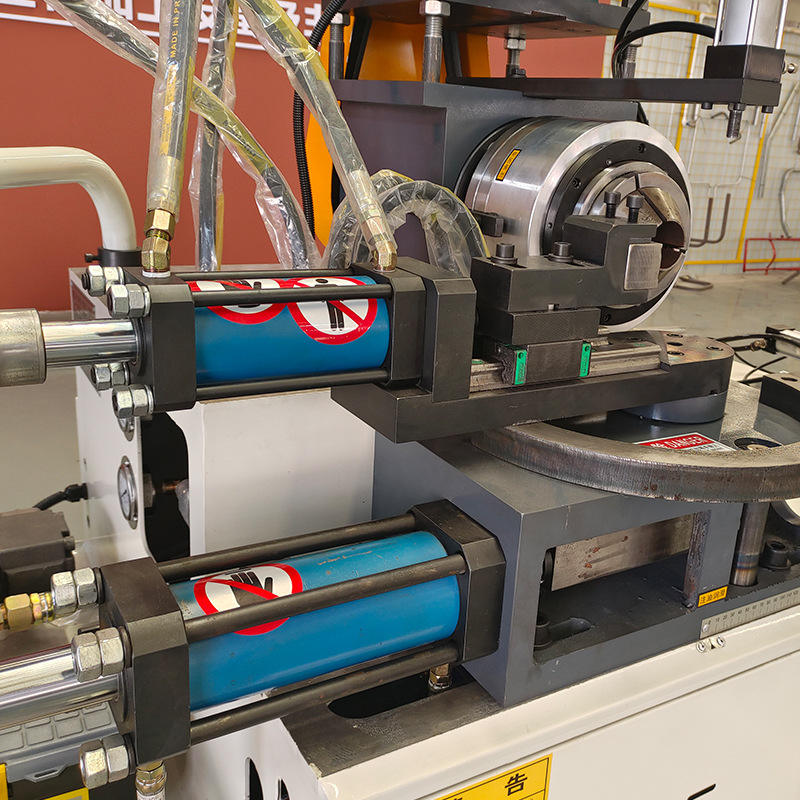 close up of tube end closing machine with rf heating system sealing head