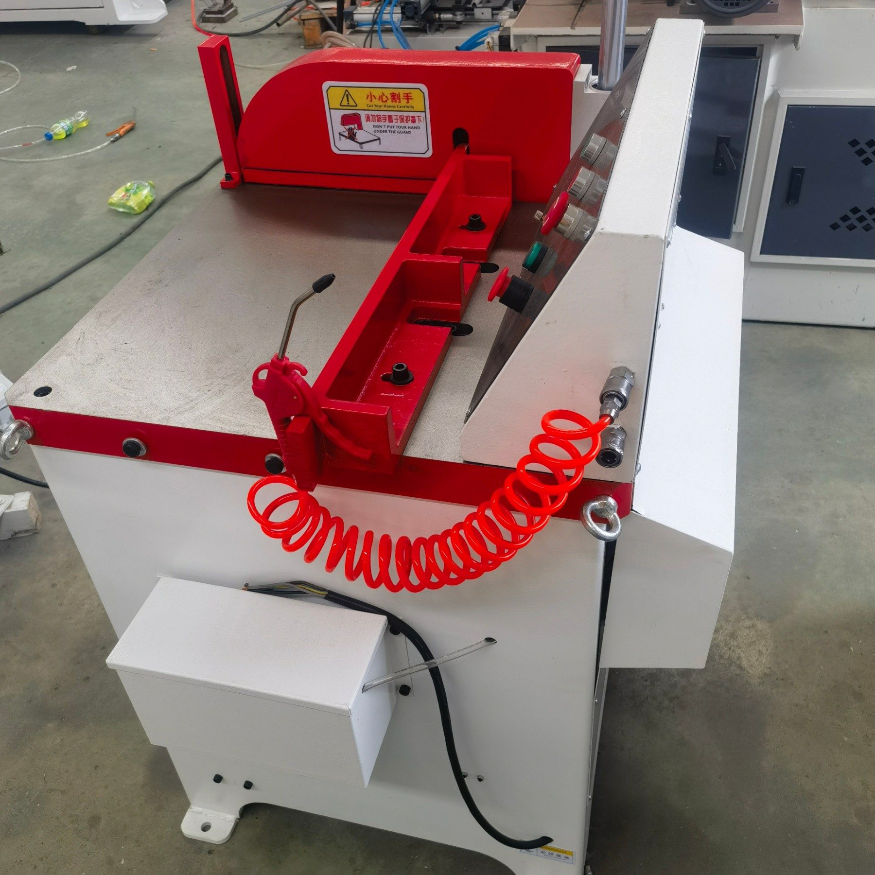 close up of aluminium cutting blade and protective guard plate ensuring smooth cutting performance