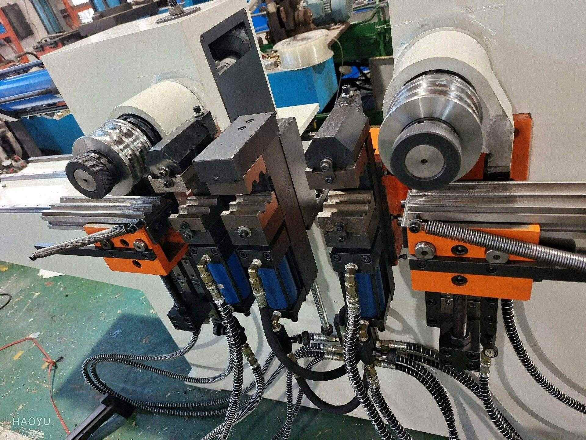 Máquina dobladora de tubos industrial de doble cabezal 2