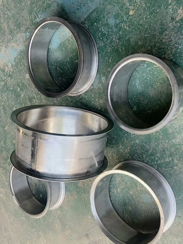 batch of metal cylinder flanged and curled finished parts