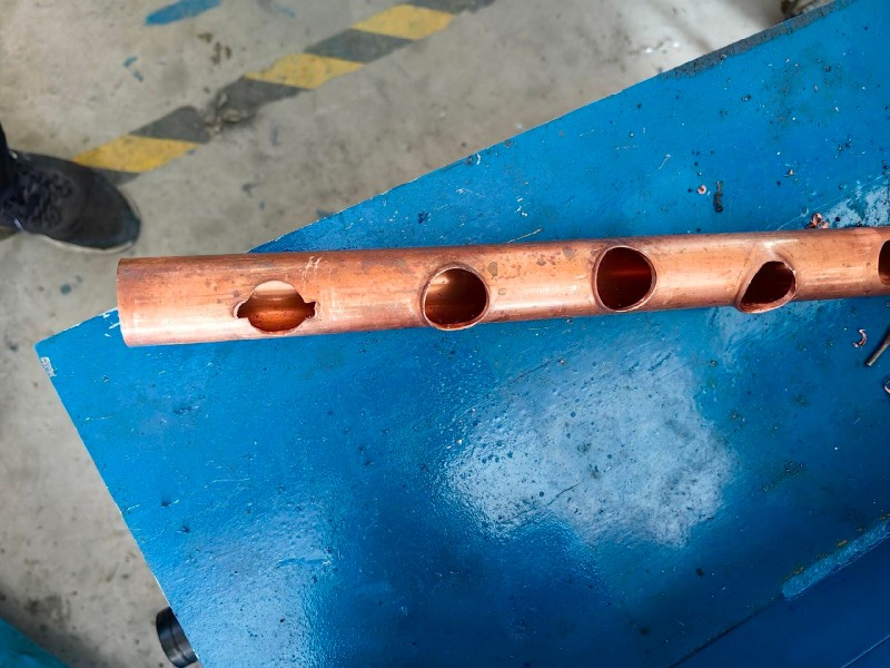 copper manifold tube with punched flanged holes