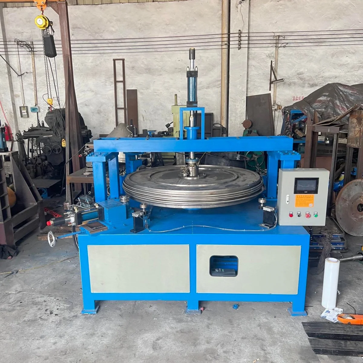 hydraulic disc flanging machine for round metal sheet processing