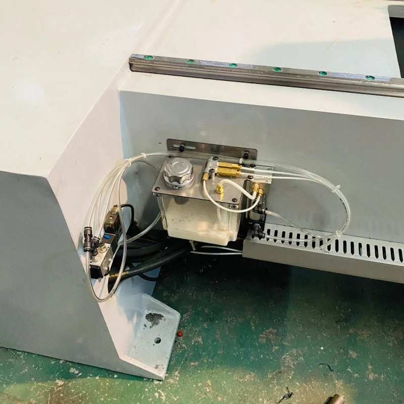 automatic lubrication system of double head chamfering machine including lubricant tank pneumatic solenoid valve and oil pipeline