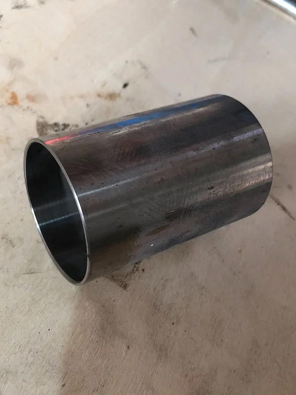 finished short steel tube workpiece after chamfering by double head chamfering machine